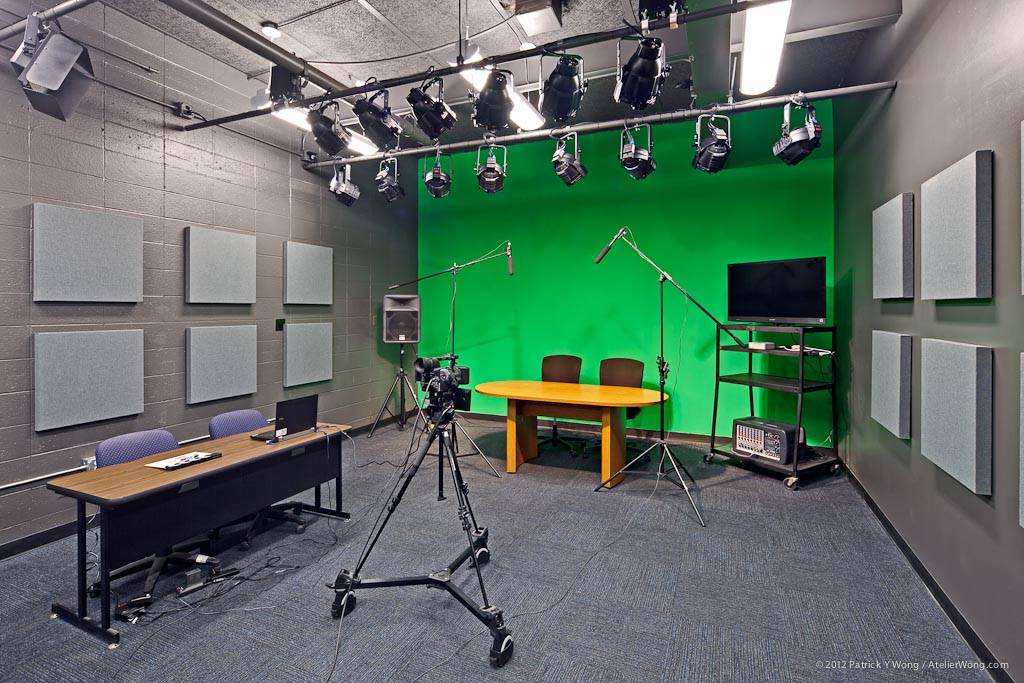 Student broadcast studio with green screen, stage lighting, and camera equipment, Reagan High School renovation, Austin TX