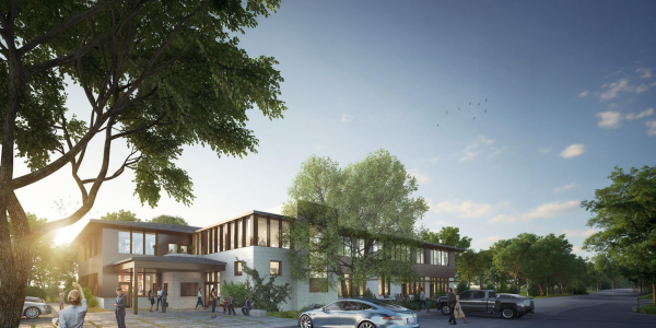 Architectural rendering of Greyrock Commons mixed-use development at sunset, featuring modern two-story facade with wood accents, landscaped grounds, and pedestrian-friendly entry, Austin TX